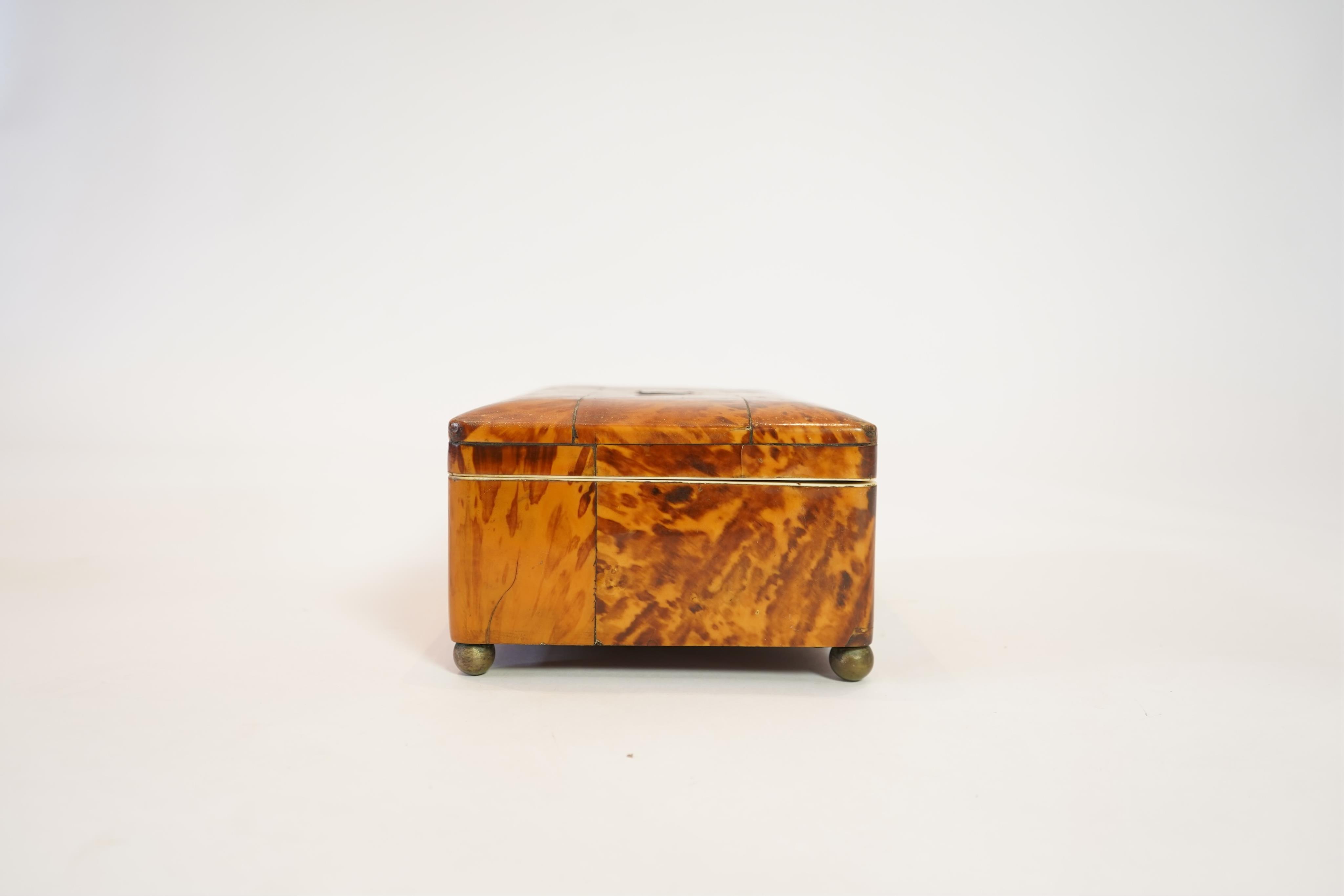 An early 19th century blonde tortoiseshell work box